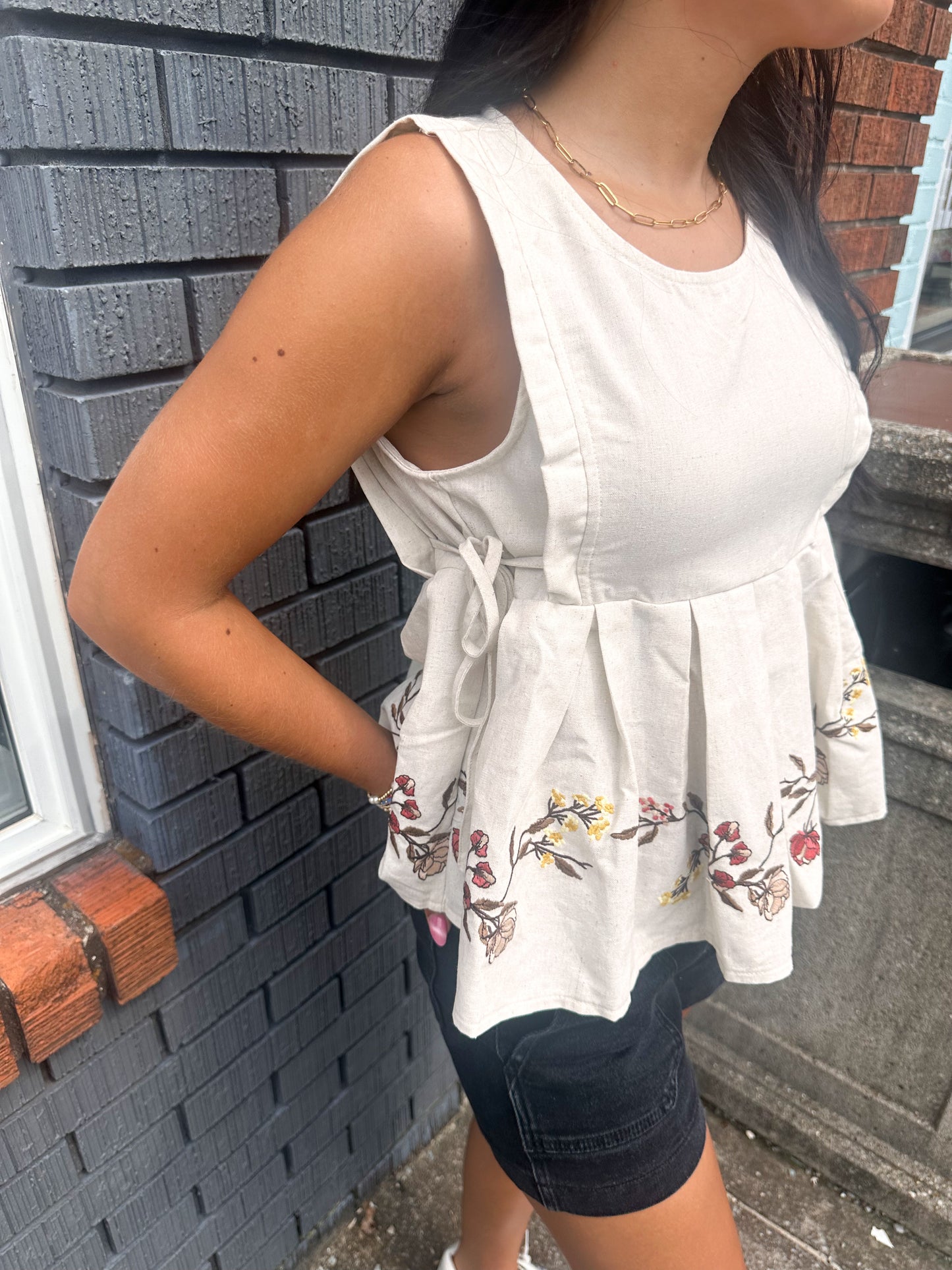 Embriodered Sleeveless Peplum Top